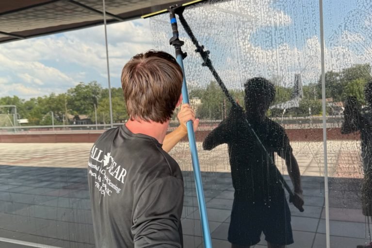 Campus window cleaning with water-fed pole Bay Area university